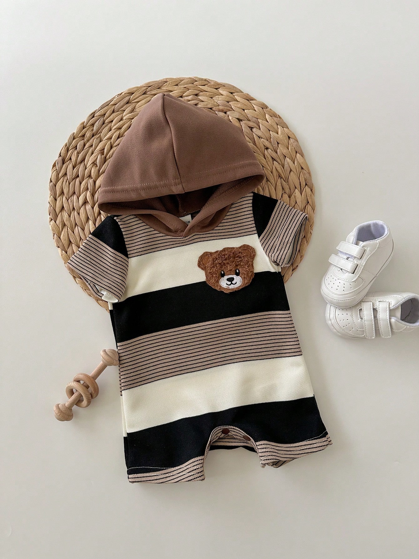 Striped linen knotted romper for newborns