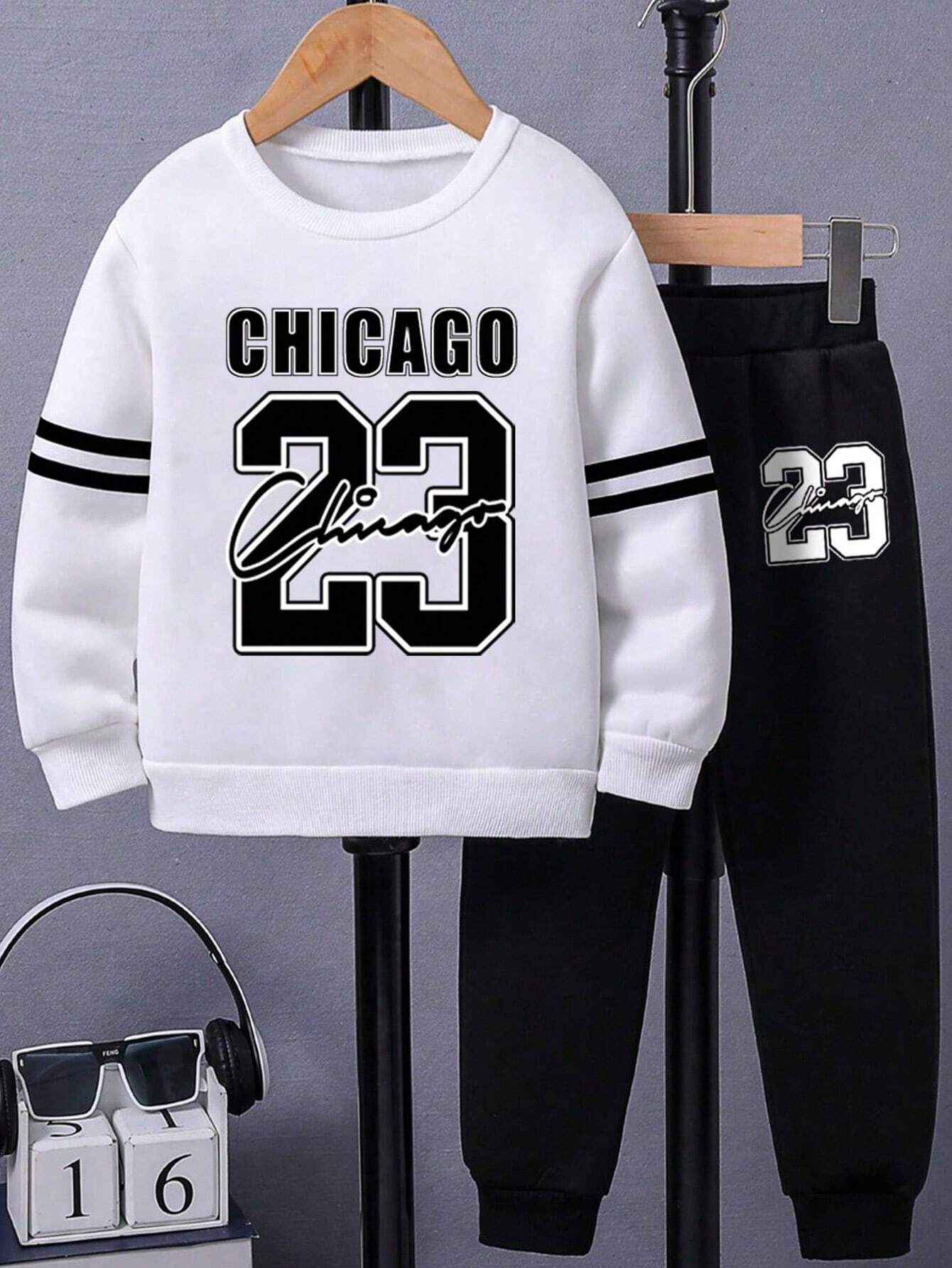 A set of crew neck jacket and straight-leg shorts