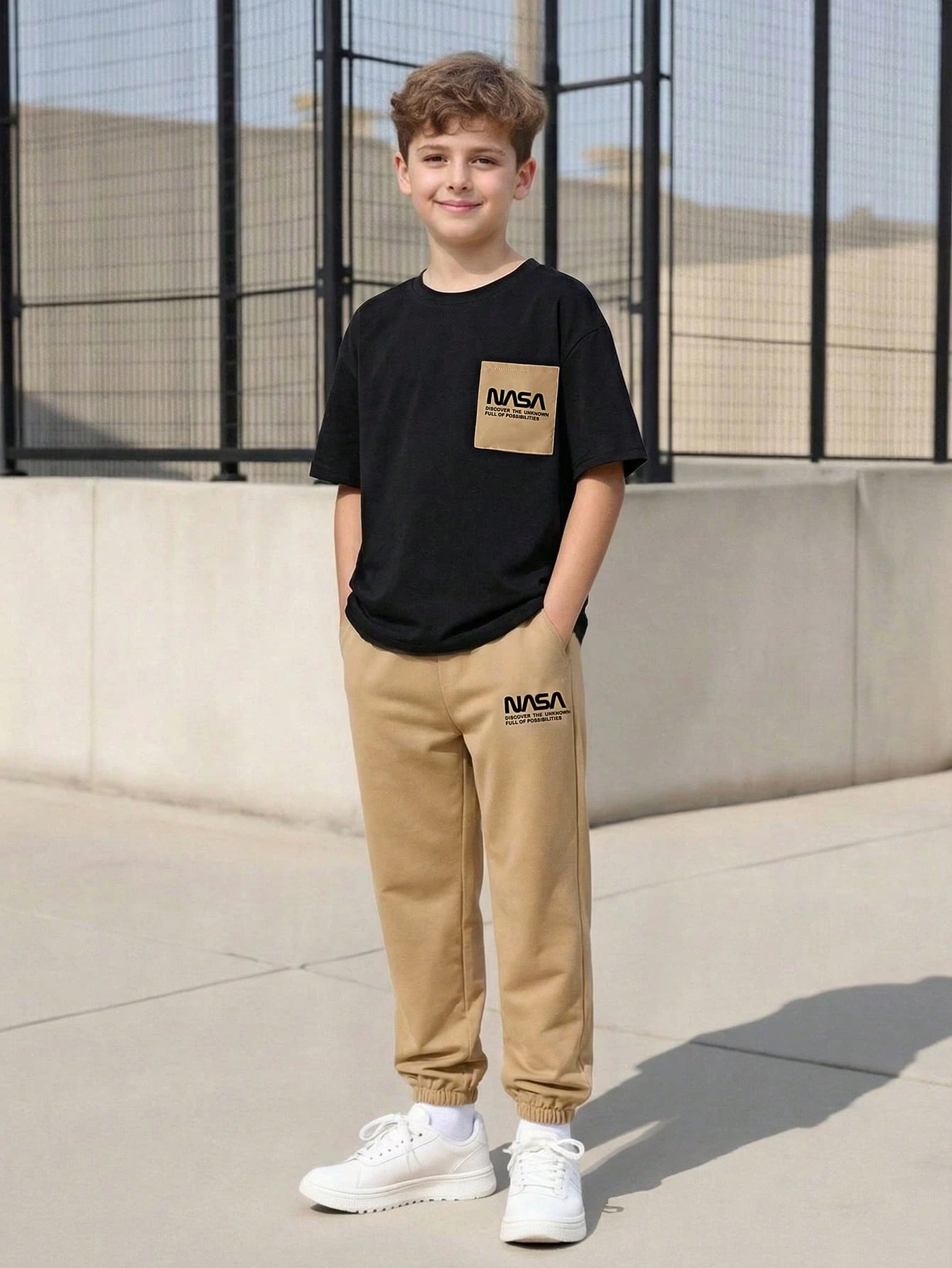 A two-piece set for teenagers, consisting of a black t-shirt and navy shorts