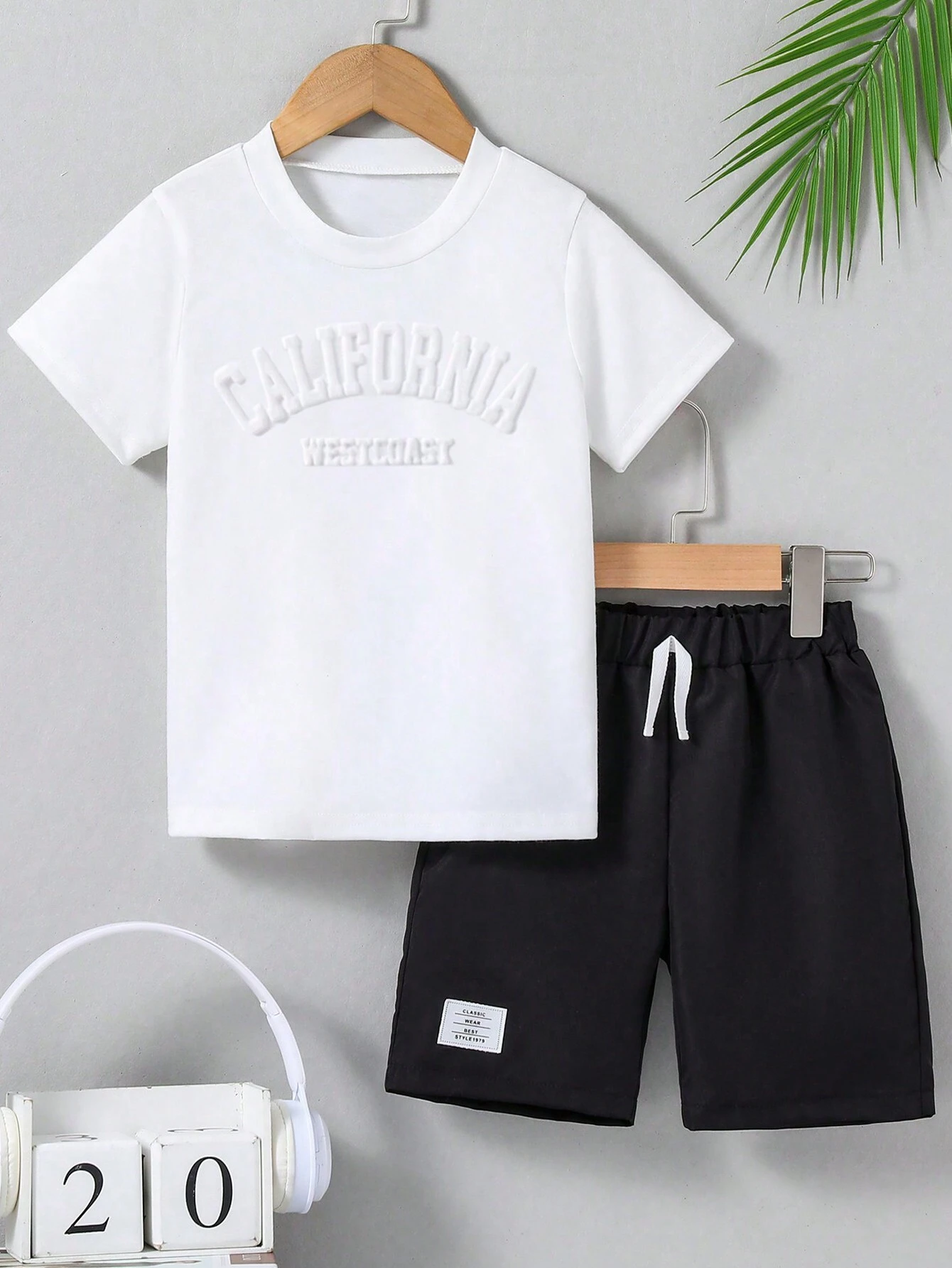 Casual cotton T-shirt for boys with a round neck and short sleeves, and shorts