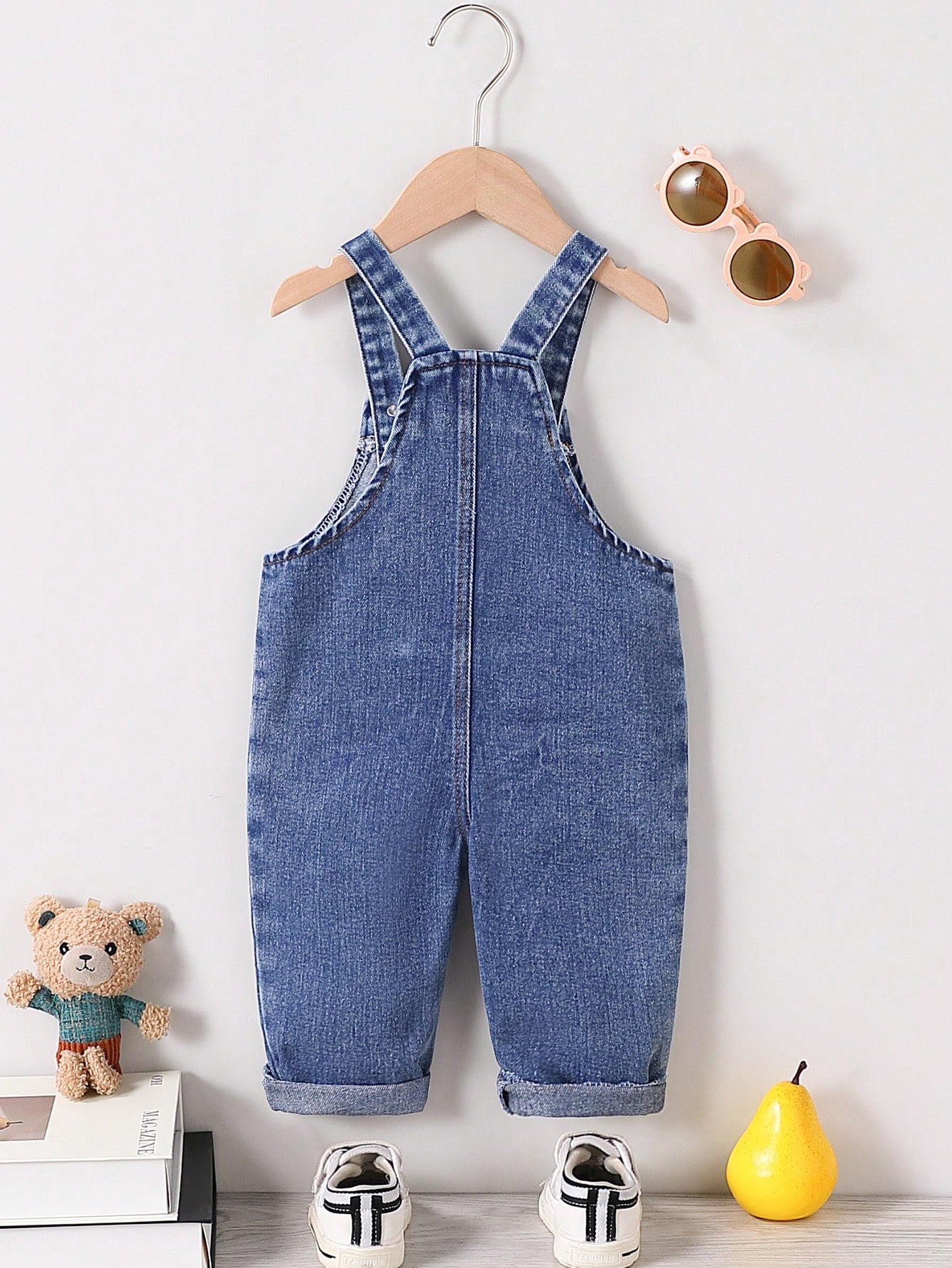 Boys' casual suspender pants in dark blue with pockets
